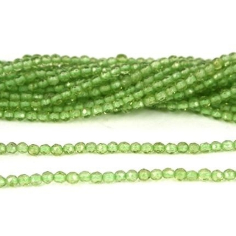 Hel streng med små 3 mm facetslebet Peridot perler