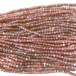 Flotte små 2 mm facslebet orange månestens perler