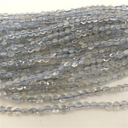 Flade runde Topaz perler. De måler ca. 4 x 2,5 mm Der er ca. 100 perler på strengen der er 40 cm. lang.