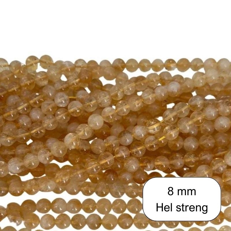 Hel streng 8 mm gul Citrin perler. der er ca. 47 perler på strengen som måler ca. 39 cm.