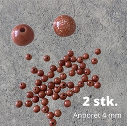 4 mm anborede Goldstone perler. Der er 2 stk. i posen. 