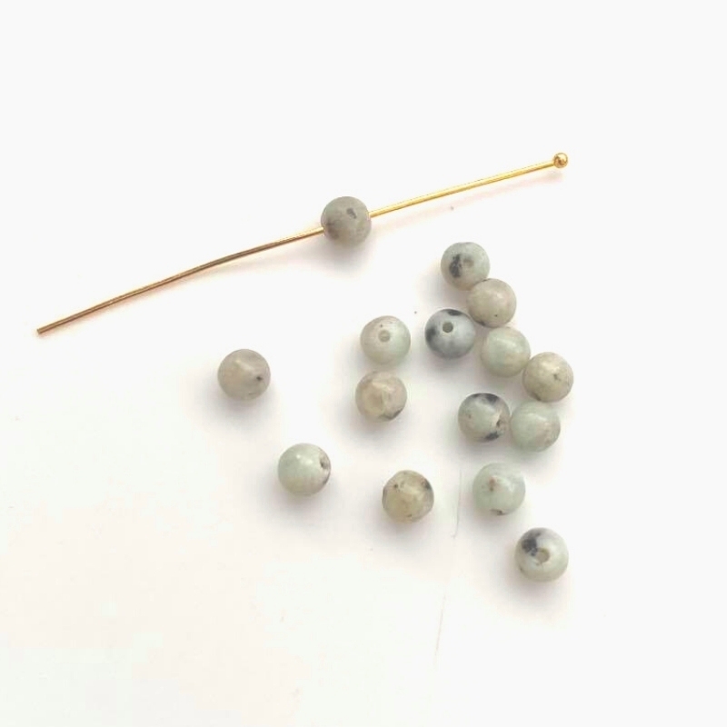 4 mm Kiwi agat perler. Her køber du en pose med 15 stk. 