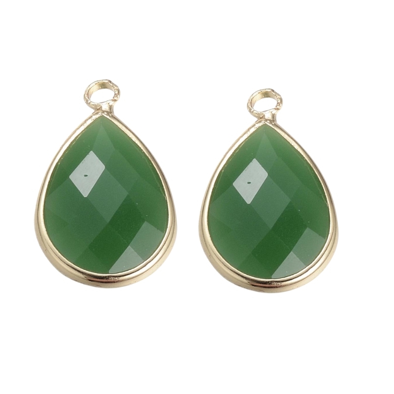 2 stk. grønne glasdråber med guldfarvet kant, til øreringe eller halskæder.