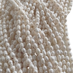 Ferskvandsperler, Hvid, Rice,  ca. 7 x  8-10 mm 1/1 streng