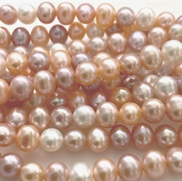 Ferskvandsperler i pastel mix farver. Perlerne er ca 7 - 8 mm store