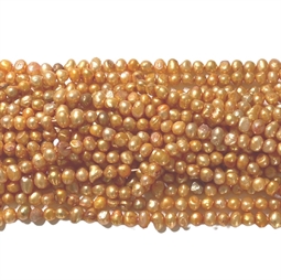 Mørk gyldne barok ferskvandsperler - Hel streng på ca. 41 cm. med ca. 70 perler på.