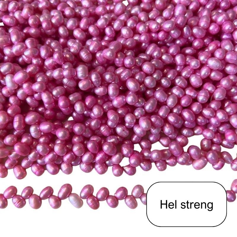 Lys pink ferskvandsperler, ca. 6 x 8 mm